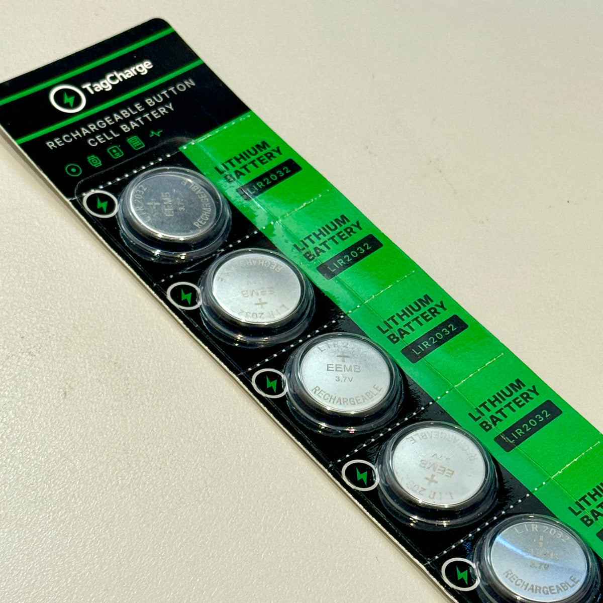 TagCharge LIR2032 rechargeable battery 5-pack blister card at an angle showing individual cells